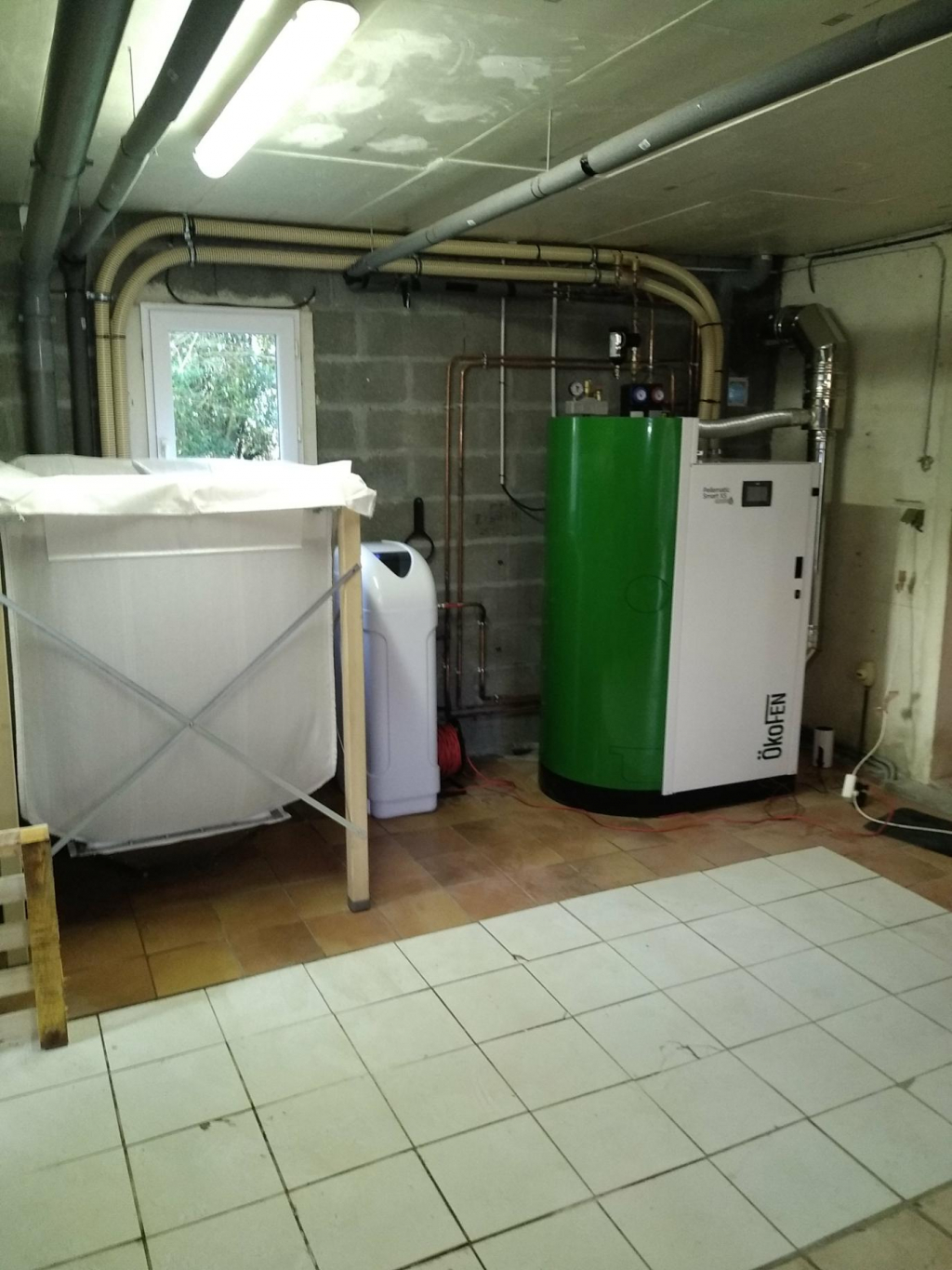 ENTREPRISE RGE- QUALIBOIS - INSTALLATION EN REMPLACEMENT D'UNE CHAUDIERE GAZ HORS CONDENSATION, D'UNE CHAUDIERE OKOFEN PELLEMATIC SMART XS 18 KW GRANULES