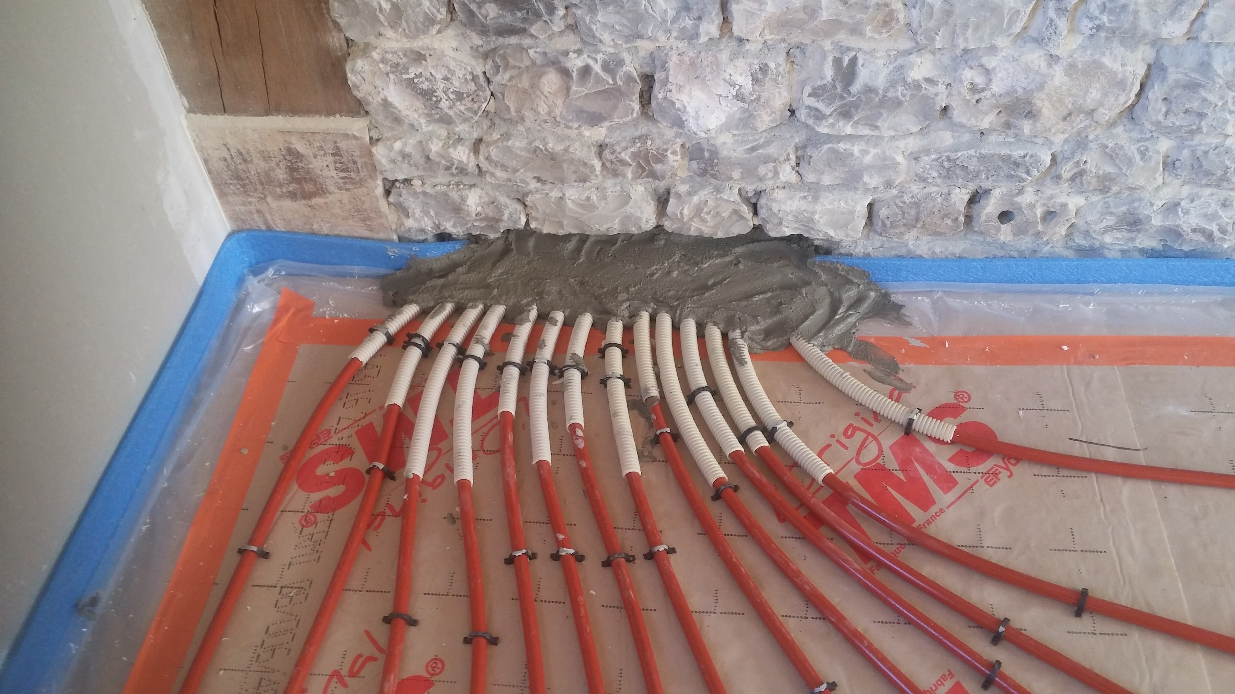 Installation d’un plancher chauffant couplé à une Pompe À Chaleur aérothermique à Branville - 14430